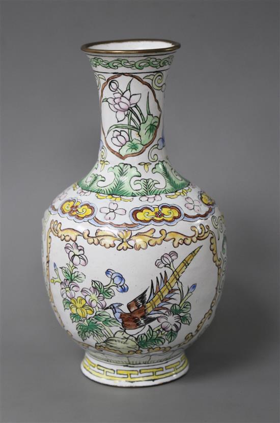 A Chinese enamelled brass vase, decorated with flowers, height 15.5cm